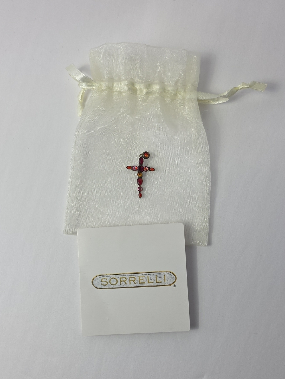 SORRELLI RED CRYSTAL CROSS CHARM/PENDENT